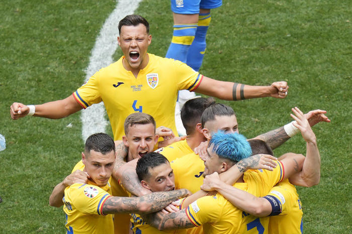 romania earns first euros win in 24 years while ukraine apologizes for 3-0 loss