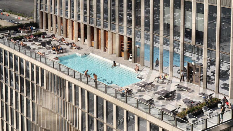 Where are the best pools and beaches in NYC? From free public pools to hotel day passes, see our list.