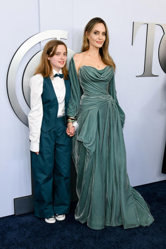angelina jolie wins tony award for ‘the outsiders' in versace, coordinates look with daughter vivienne on red carpet