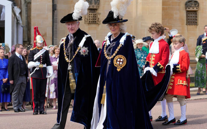 king leads senior royals in colourful garter day procession