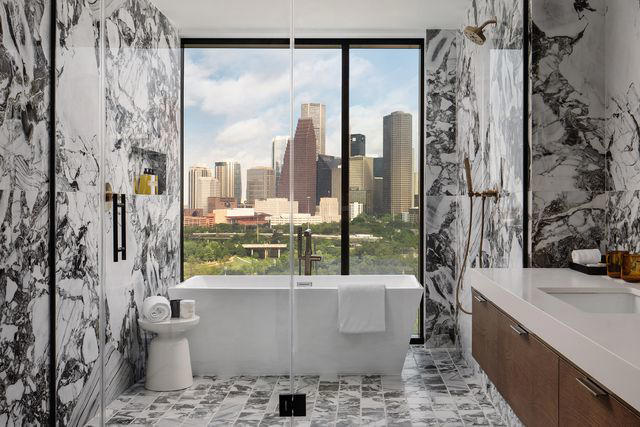 this chic new houston hotel has a rooftop infinity pool, luxe spa, and panoramic city views — and we were among the first to stay