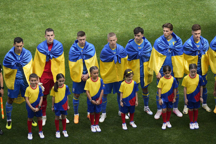 romania earns first euros win in 24 years while ukraine apologizes for 3-0 loss
