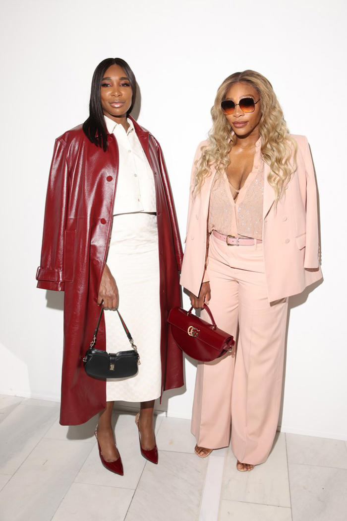 venus and serena williams model trending maroon and blush tones alongside mother and half sister at gucci menswear spring 2025 show in milan