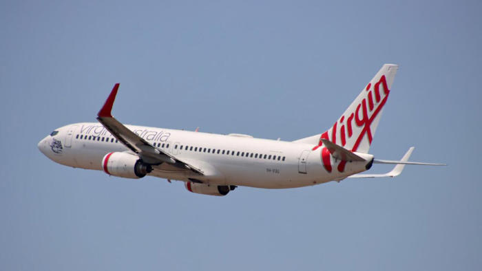 virgin australia plane catches fire after take off