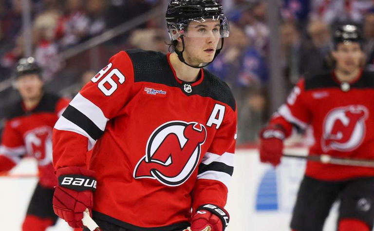 A RWJ Barnabas logo is now on the front of the New Jersey Devils jerseys, as seen on the front of center Jack Hughes (86) jersey during the third period, Thursday, Feb. 22, 2024 in Newark, N.J. The Rangers won, 5-1.