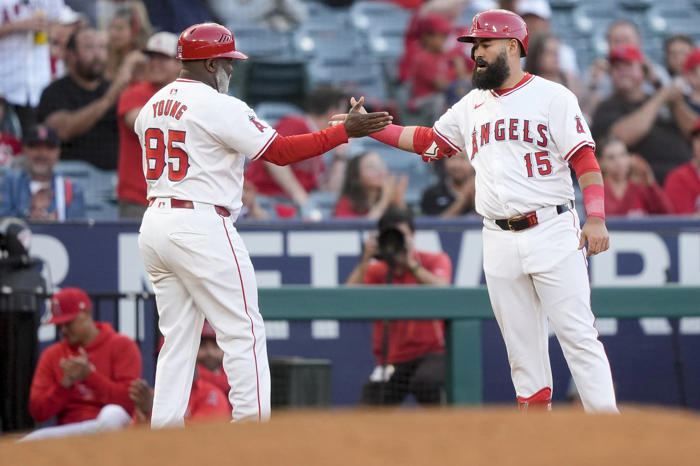 plesac throws 6 solid innings in his angels debut, and neto homers in la's 5-3 win over brewers