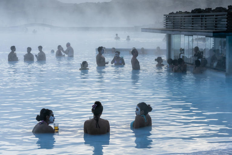 People seen relaxing at Blue Lagoon, Grindavík, Iceland.