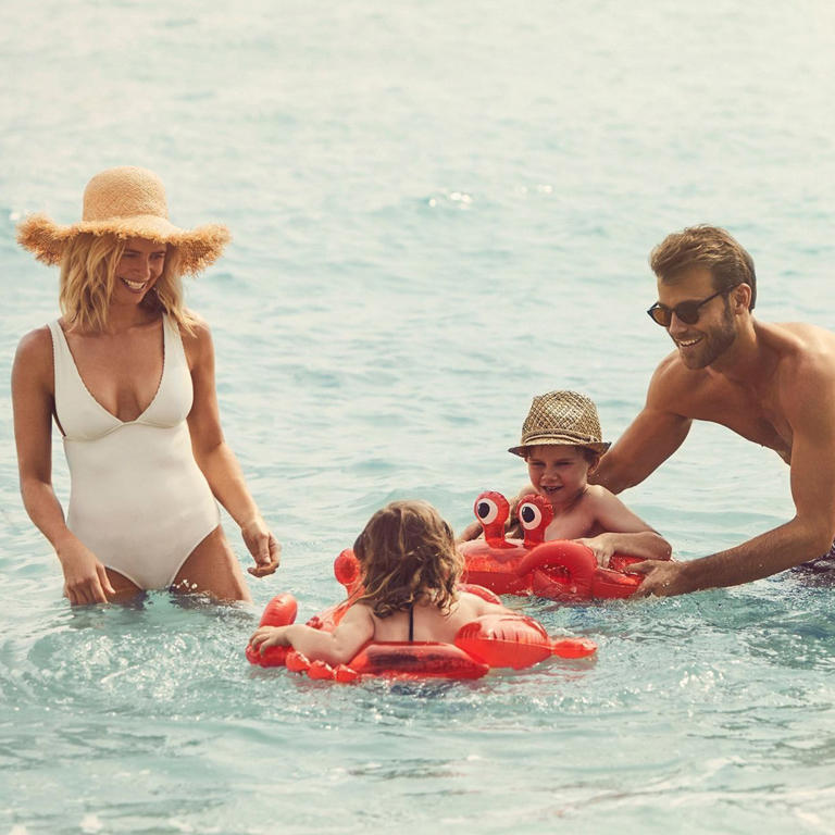 A family enjoying the pool at Daydream Island resort