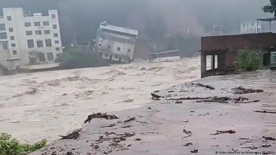 rains and landslides kill at least nine in southern china