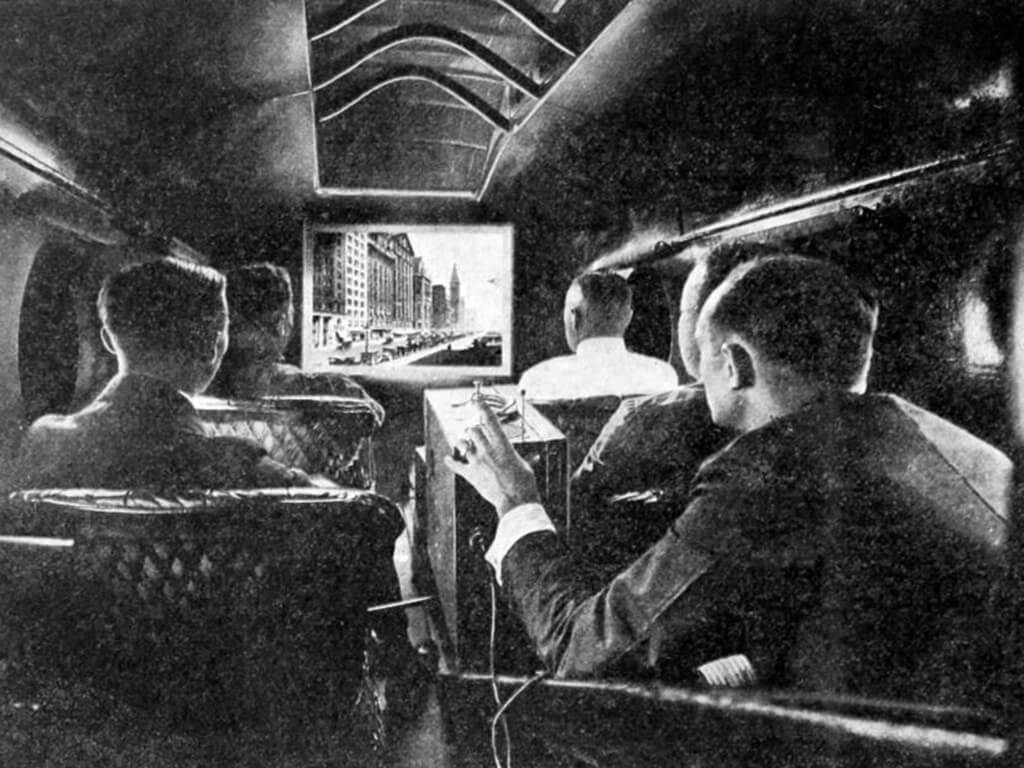 <p>Trapped inside a metal tube for several hours with no iPad to occupy you, what else to do other than play board games, right? Before aviation introduced screens to watch movies, there were more simple ways to pass the time. For example, these men are enjoying a slideshow projection during their travels!</p> <h2 class="wp-block-heading">Watching Movies Gave You Neck Pain</h2>