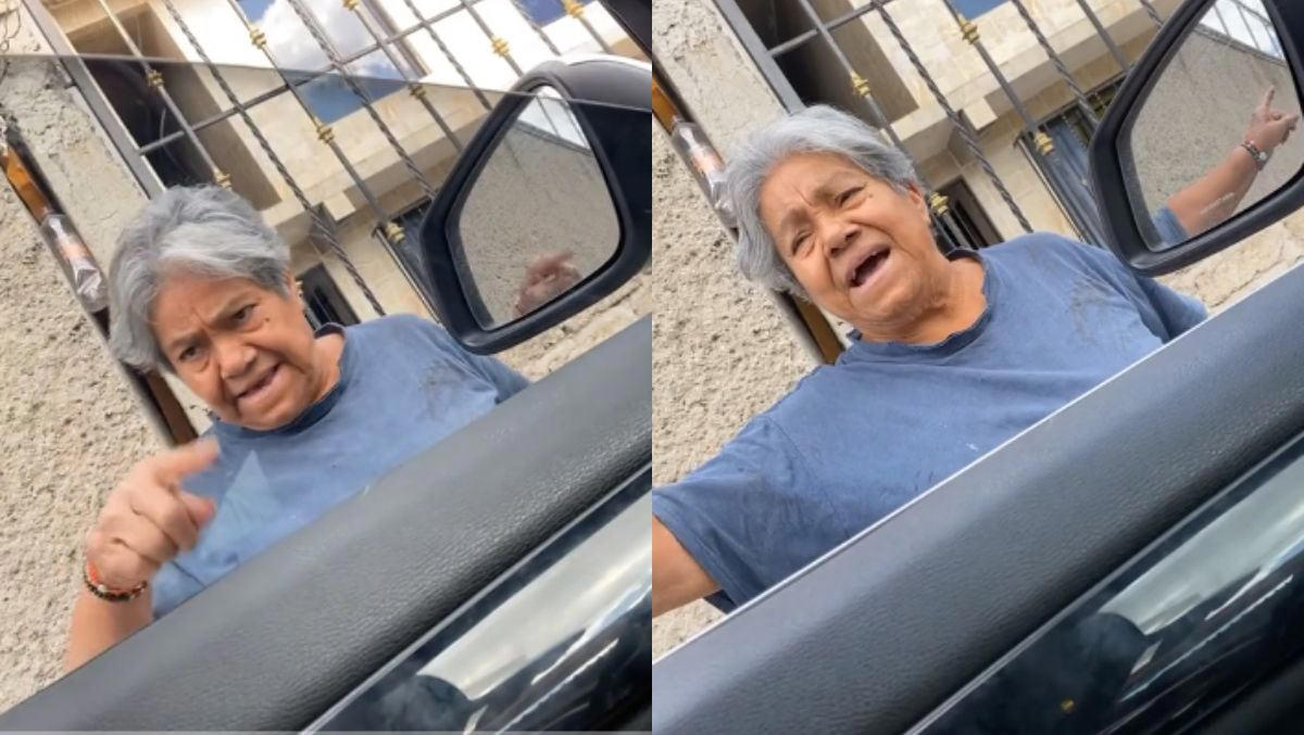 señora explota del coraje contra un hombre que se había estacionado enfrente de su casa | video