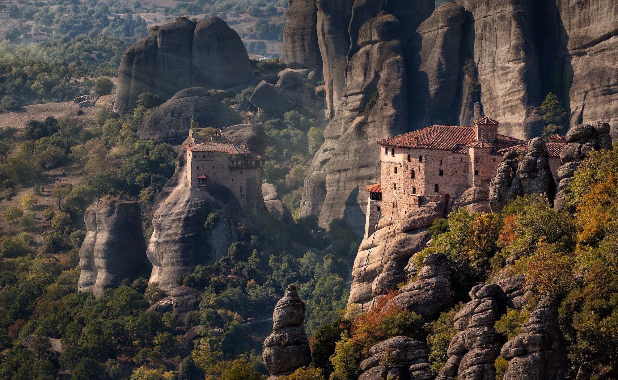 <p>Meteora is another childhood trip I'll always remember. Located in central Greece, the Meteora monasteries — now a UNESCO World Heritage Site — are perched on huge cliffs that will take your breath away. </p><p>Orthodox Christian hermit monks first began coming to the cliffs of Meteora around the 9th century, looking for peace and isolation. In the 14th century, the first Meteora monastery was built, spearheading the beginning of the site's monastic community, according to <a href="https://visitmeteora.travel/meteora-monasteries/">Visit Meteora</a>. Six of the 24 monasteries remain active today with more than 60 nuns and monks. </p><p>"It's absolutely amazing to realize that monks built these monasteries and lived there for centuries," my mom said. "The unique rock formations and nice sunsets offer many photo opportunities. It's a really special place that makes me feel close to heaven." </p>