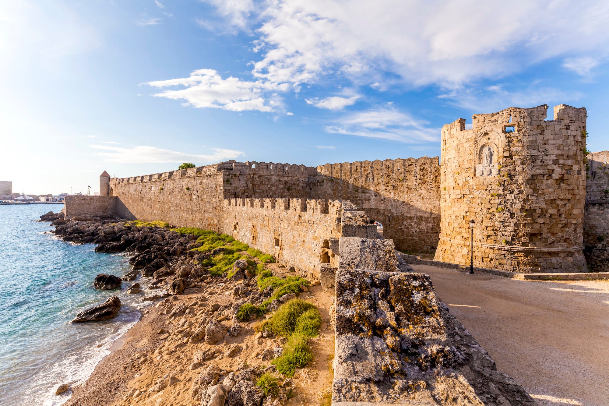 <p>Ruled by the Knights of St. John from the 14th to 16th century, Rhodes still feels steeped in medieval history. I remember being wowed as a kid while walking past the majestic castles, under the stone arches, and through the tiny cobblestone alleys on the island's Old Town. </p><p>Rhodes also has plenty of beautiful beaches, as well as Butterfly Valley — my mom's favorite part of the island.</p>