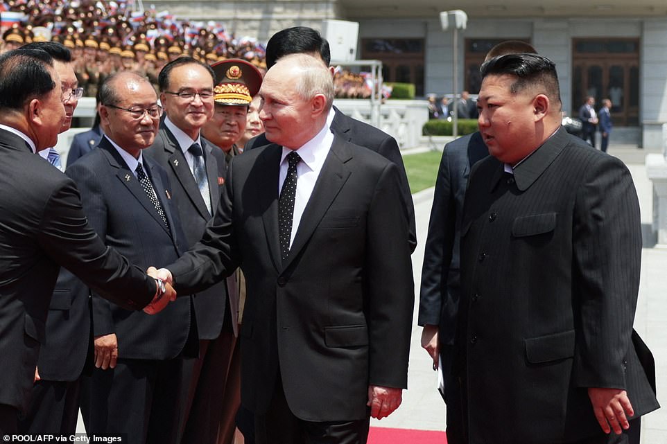 Thousands Of North Koreans Cheer On Street As Putin Begins State Visit