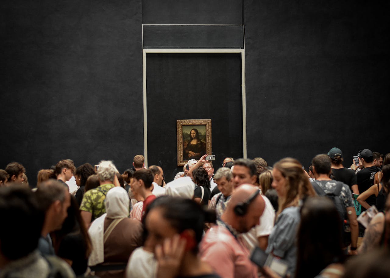 <p>Sure, The Louvre might be home to hundreds of other masterpieces, but for some reason the<em> Mona Lisa </em>is the main attraction. </p>