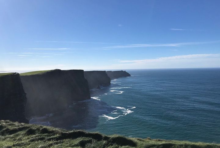 <p>For travelers seeking awe-inspiring natural beauty, the Cliffs of Moher in Ireland are an essential pilgrimage. These towering cliffs, soaring up to 214 meters above the Atlantic Ocean, present a mesmerizing panorama of Ireland’s rugged western coastline and offer some of the most gorgeous sunrise and sunset views.</p>