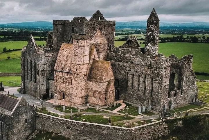 <p>The Rock of Cashel is associated with Ireland’s early Christian heritage, dating back to the 5th century. This ancient fortress has a collection of medieval structures, including a stunning round tower, cathedral, and high crosses, all set against the backdrop of the rolling Irish countryside. </p>