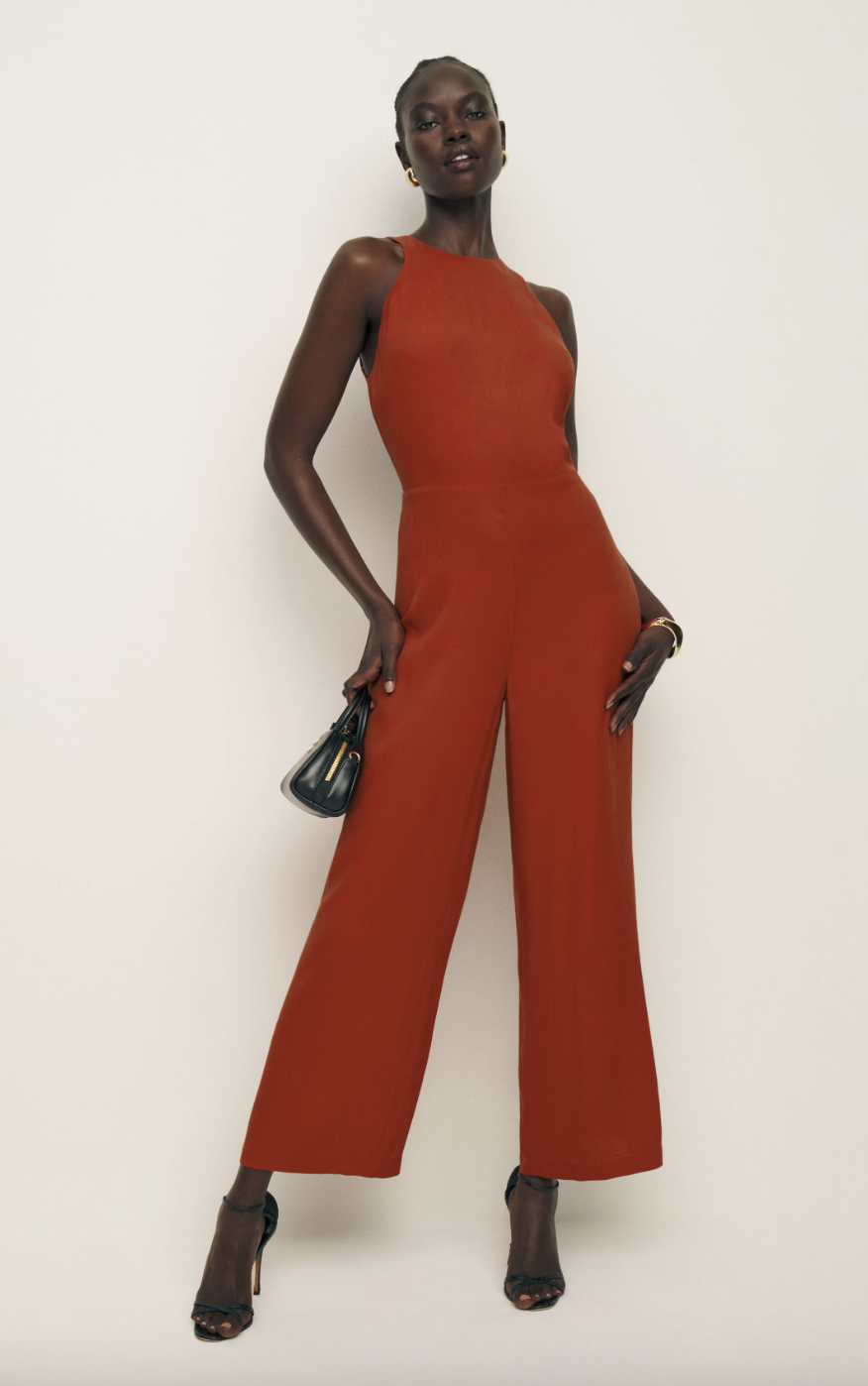 <p><strong>£248.00</strong></p><p><a href="https://www.thereformation.com/products/lucia-jumpsuit/1312433SDM.html?dwvar_1312433SDM_color=SDM">Shop Now</a></p><p>This Reformation baby is perf for wedding szn and beyond, with its cropped wide leg, flattering halterneck and open back. We'll be dreaming about this one... </p>