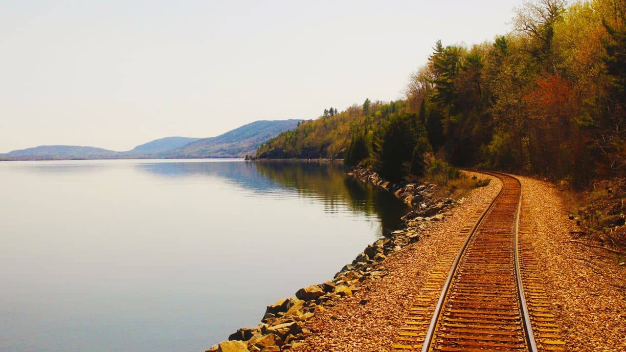 <p>The Amtrak Adirondack offers a ten-hour <a href="https://www.amtrak.com/adirondack-train" rel="noopener">journey</a> from New York City to Montreal. You will meander through charming towns and check out the stunning vineyards in the Hudson Valley. </p><p>You’ll also spot some interesting mansions and stunning riverbanks between New York City and Albany. There’s also a cafe car, so you won’t be starving along the way. The train leaves New York in the morning and arrives in Montreal in the evening. </p>