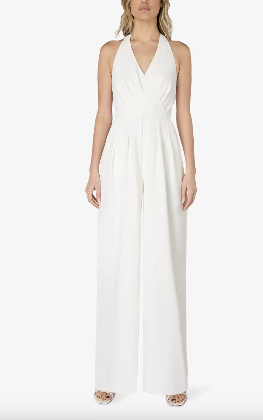 <p><strong>£199.00</strong></p><p><a href="https://www.selfridges.com/GB/en/product/rozo-wide-leg-halter-neck-stretch-woven-jumpsuit_R04317050/#colour=WHITE">Shop Now</a></p><p>RO&ZO's white jumpsuit is defined by its flattering halter-neck, fitted waist and wide-leg style. You'll wear this one on repeat, long after the wedding, too.</p>