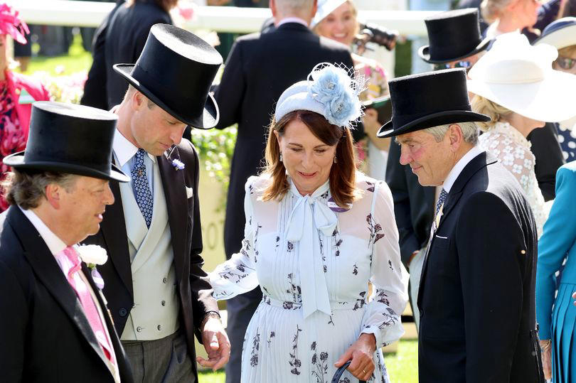 prince william comes to carole middleton's aid as she gets heel caught in ascot turf