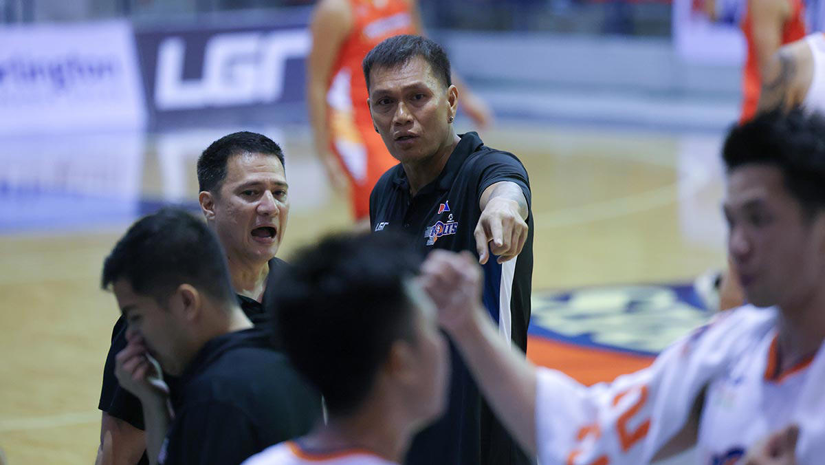 reynel hugnatan's loyalty to meralco pays off with long-awaited championship