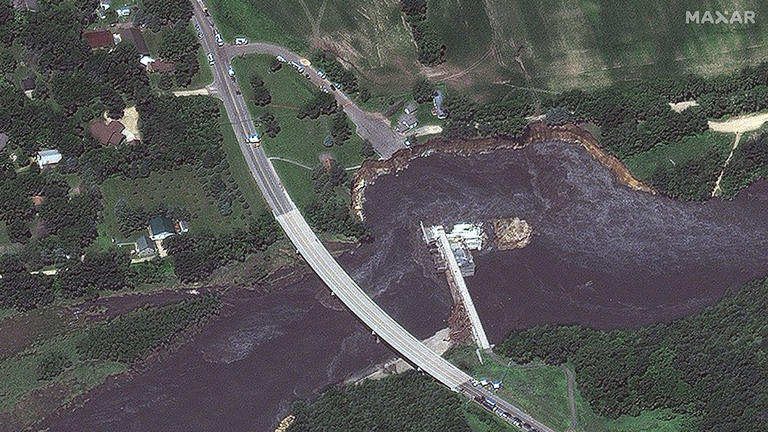 Satellite images reveal devastating flooding following partial failure ...