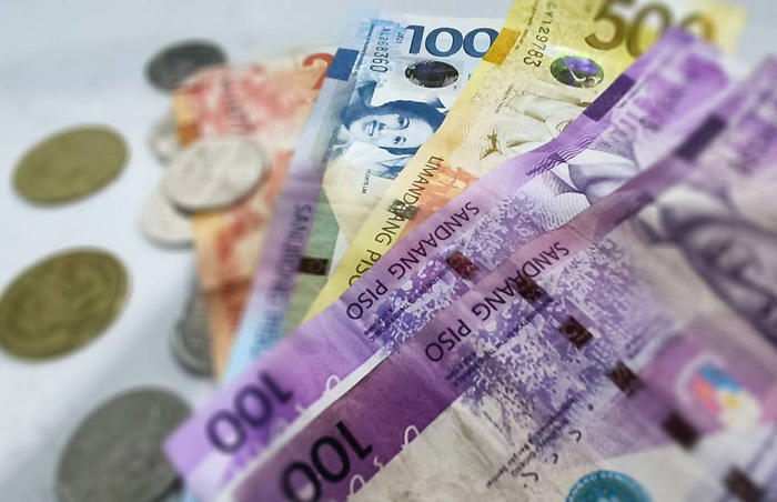 peso drops to p58.86:$1; stock market up anew