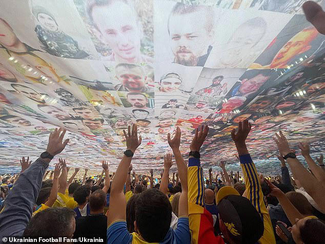 ukraine supporters unfurl huge mosaic of football-loving soldiers