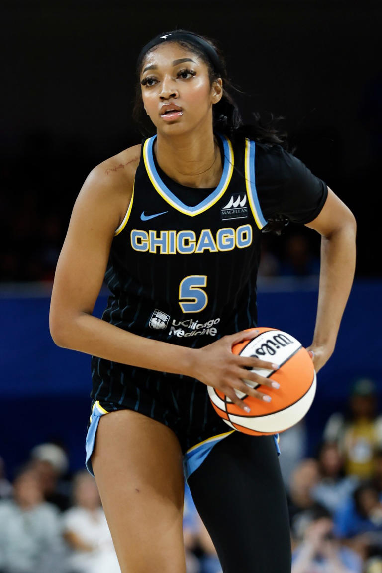 Chicago Sky forward Angel Reese (5) looks to pass the ball against the Indiana Fever during the second half of a basketball game at Wintrust Arena on June 23, 2024. Kamil Krzaczynski-USA TODAY Sports