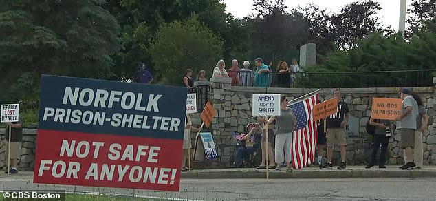 small town residents protest as first migrant families arrive