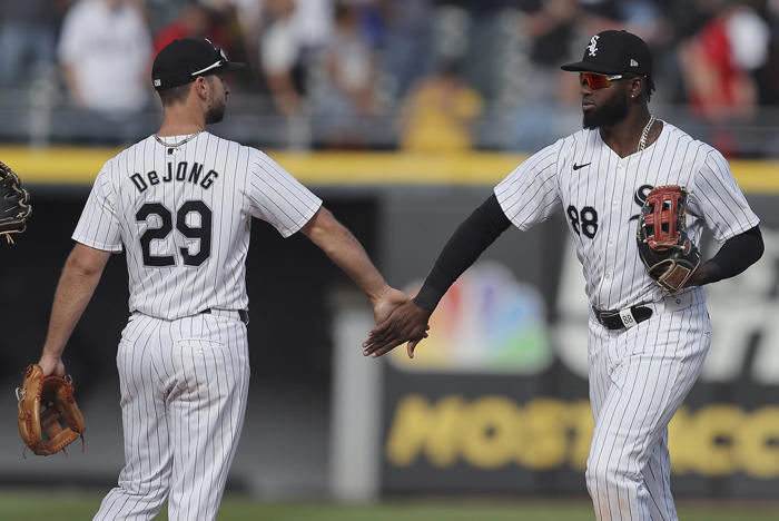 robert homers early and 5 pitchers lead the white sox to a 1-0 win over chris sale and the braves