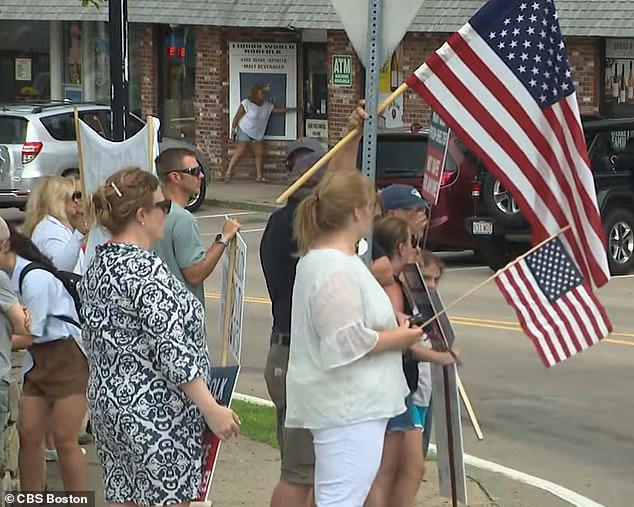 small town residents protest as first migrant families arrive