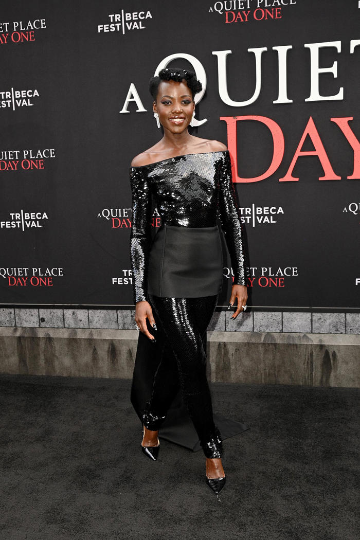 lupita nyong'o exudes eerie elegance at ‘a quiet place: day one' premiere