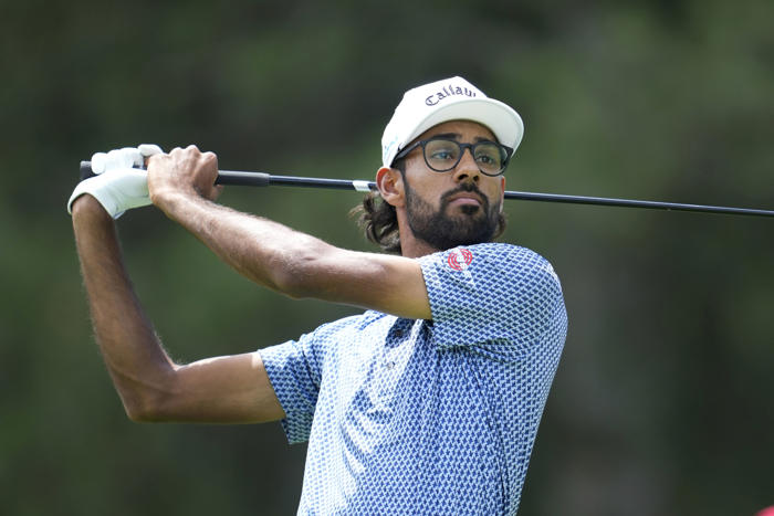 akshay bhatia shoots 64 in detroit to take 1st-round lead at rocket mortgage classic