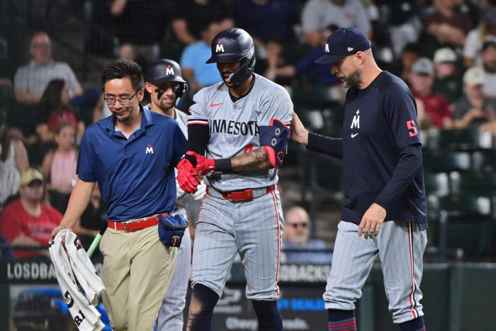 star twins infielder leaves game after being hit on wrist