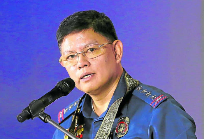 pnp chief warns moonlighting cops