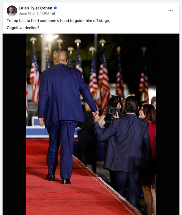 fact check: photo allegedly shows trump holding son's hand because he needed help leaving stage. here's the truth