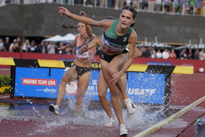 steeplechaser stumbles through water barrier, tumbles over last hurdle to miss olympic spot