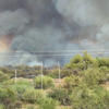 Residents in parts of Arizona’s most populous county asked to evacuate as a wildfire threatens homes<br>