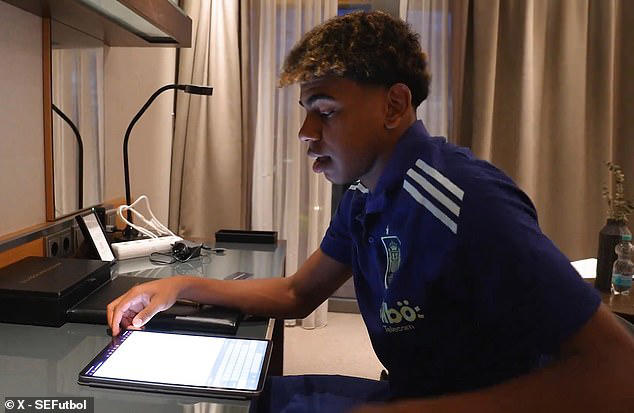 lamine yamal discovers his school exam results while on national team duty at euro 2024... after spain wonderkid, 16, was seen doing his homework while at the tournament