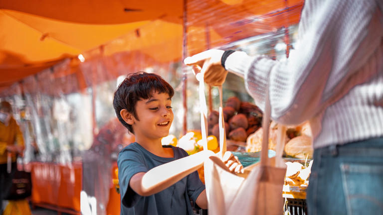 Families on Costa Cruises can enjoy family-style excursions in the Mediterranean, like visiting a local market in Palermo.