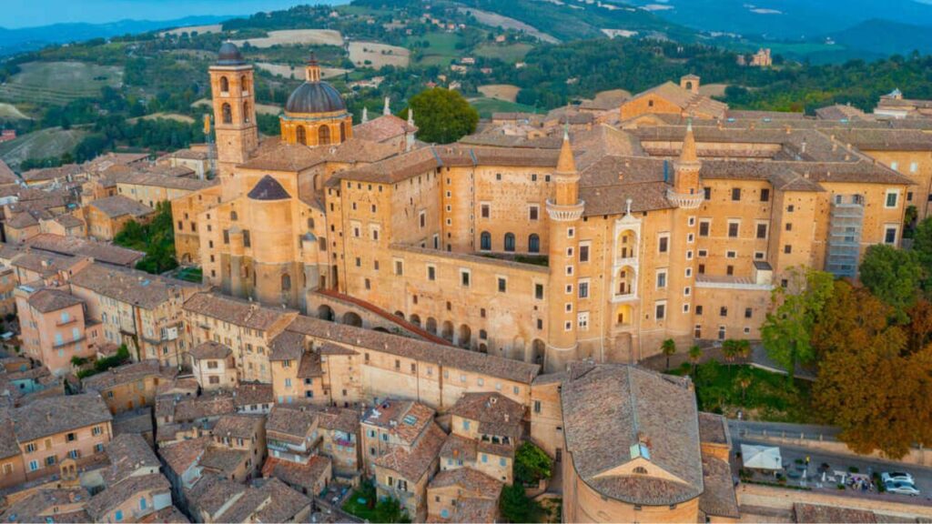 <p>Urbino is a city that is not frequently visited by tourists. However, that doesn’t mean it is less beautiful. In fact, the metropolis is full of stunning buildings and is a mix of history and art. </p><p>You can visit the Ducal Palace, which houses the Marche Gallery. It is where you can find the wonderful works of Piero della Francesca, Rafael, and Titian. As for food, you can try out Ristorante Antica Osteria Da La Stella, Ristorante Osteria L’Angolo Divino, and Ristorante Taverna La Fornarina for an unforgettable dining experience. </p>