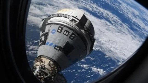 shattered russian satellite forces iss astronauts to take shelter in stricken starliner capsule