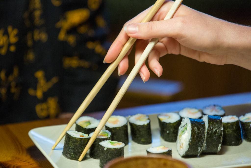 <p>While sushi may seem like something you can eat in one bite without paying attention, that's not entirely true. Many people enjoy dipping their sushi in soy sauce or eating the kind with a plentiful amount of toppings on it that make it a hazard. </p> <p>In addition, if you plan on being in the car for a long time, you might want to avoid eating raw fish, which is more likely to make you sick than countless other foods. </p>