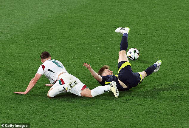 uefa's referee chief backs controversial decision to deny scotland penalty in defeat to hungary as he states that stuart armstrong 'initiated the contact'