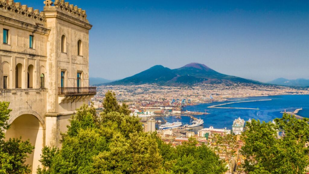 <p>Known as the hometown of pizza, Naples is more than just a gastronomic destination. Here, you can enjoy the breathtaking views of the Vesuvius volcano on one side and the stunning seascape on the other.</p><p>It is a city full of contrasts. It is fun and chaotic, with its heavy traffic city center and historic center listed as one of the UNESCO World Heritage Sites. You can also visit the Christmas Alley and feel the festivity year-round.</p>