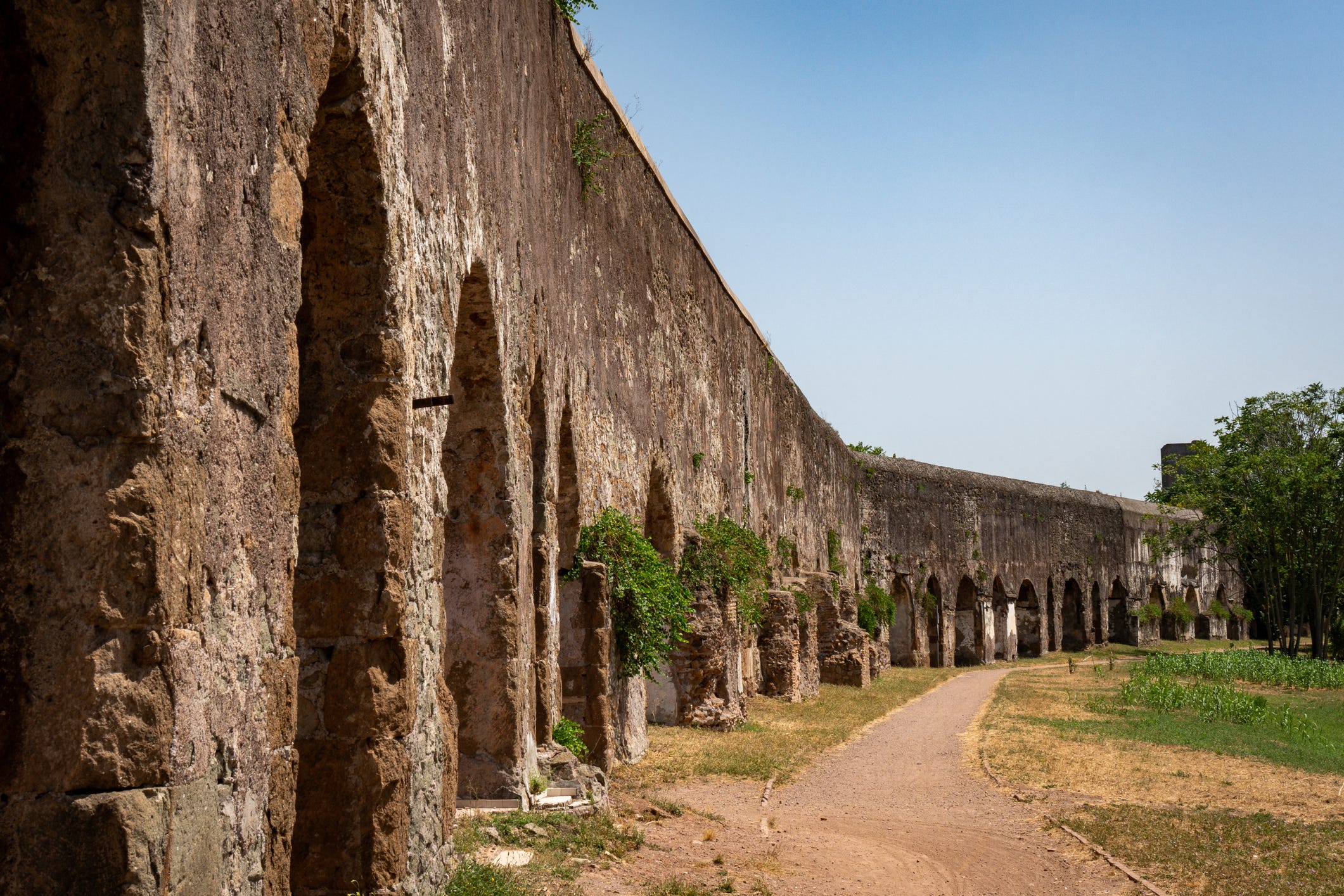 <p>The Parco degli Acquedotti, or the Park of the Aqueducts, extends for nearly 600 acres just outside of Rome.</p><p>Also a popular spot for cycling, dog-walking, and picnics, the massive park comprises the remains of ancient Roman aqueducts that carried fresh drinking water from the mountains and into the city.</p><p>It's one of my favorite places to visit on warm spring or summer days for a walk and to <a href="https://www.businessinsider.com/avoid-crowds-rome-day-trip-italian-city-bracciano-worth-it-2024-1">escape the city</a> for a bit, and it's particularly beautiful at sunset.</p>