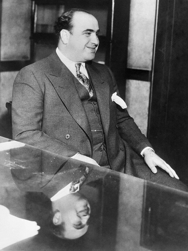 <p>Johnny Torrio, a prominent mobster, recognized Capone's potential and became his mentor. </p> <p>Under Torrio's guidance, Capone learned the intricacies of organized crime, developing his skills in bootlegging, betting, and establishing his own criminal empire in the Prohibition era.</p>