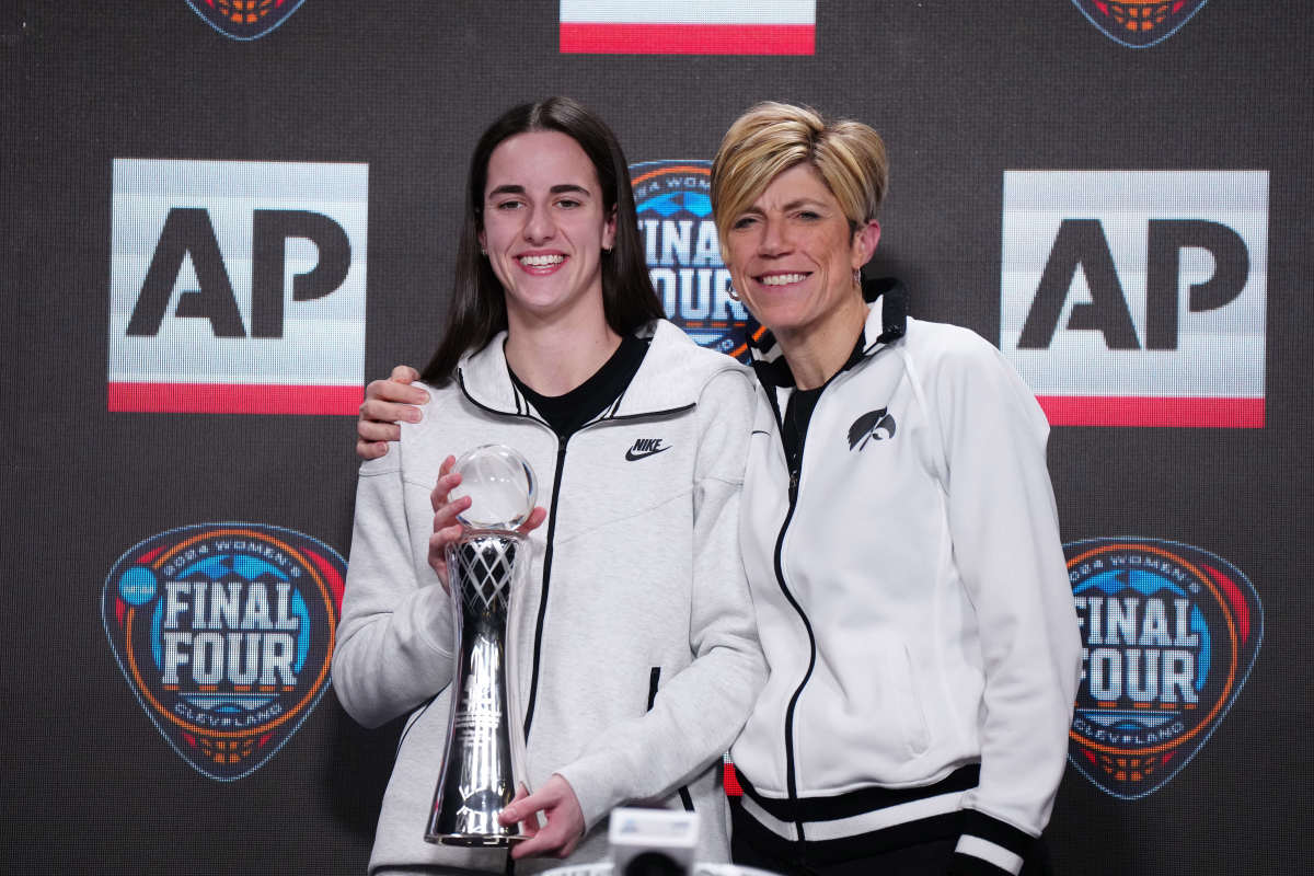 Former Iowa Hawkeyes guard Caitlin Clark and associate head coach Jan Jensen. Kirby Lee-USA TODAY Sports via Imagn Images.